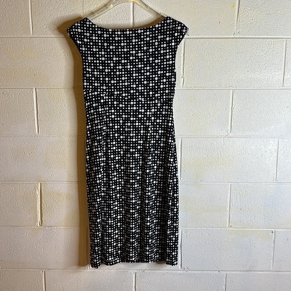 Lovely like new wrap dress in a size 12 in a polka dot print, soft material. - Picture 5 of 7